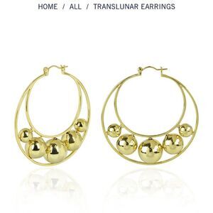 Stunning Translunar hoop
Earrings new without tags nOIr jewelry